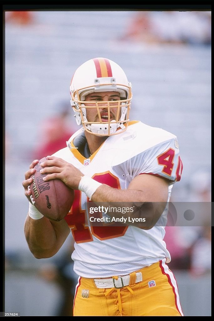 Running back Mike Alstott of the Tampa Bay Buccaneers looks to pass
