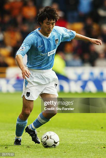 Sun Jihai of Manchester City runs with the ball during the FA Barclaycard Premiership match between Wolverhampton Wanderers and Manchester City held...