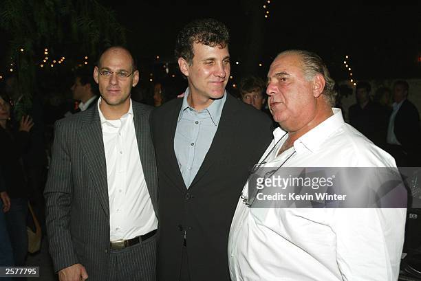 Regency's Sanford Panitch and David Matalon pose with director Gary Flederat the after-party for "Runaway Jury" at Cafe Le Duex on October 9, 2003 in...
