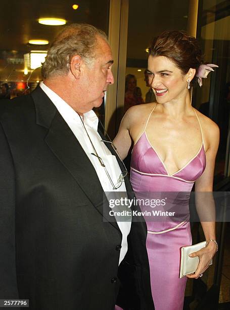 Regency Enterprises' David Matalon and actress Rachel Weisz arrive at the premiere of "Runaway Jury" at the Cinerama Dome Theatre on October 9, 2003...