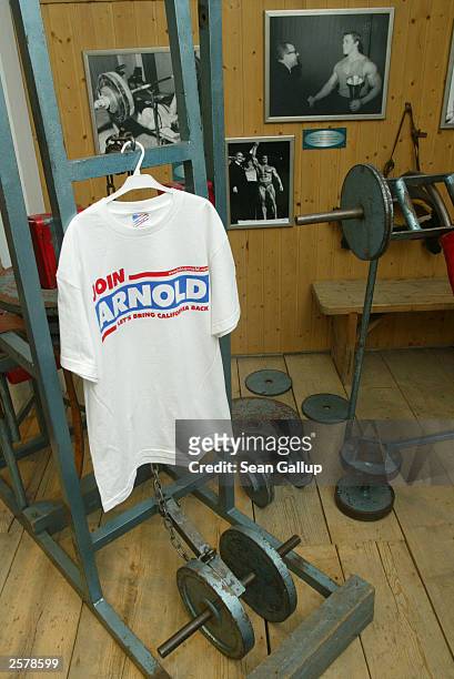 Weightlifting equipment from the original gym where Arnold Schwarzenegger first began training, stand on display along with photographs and a...