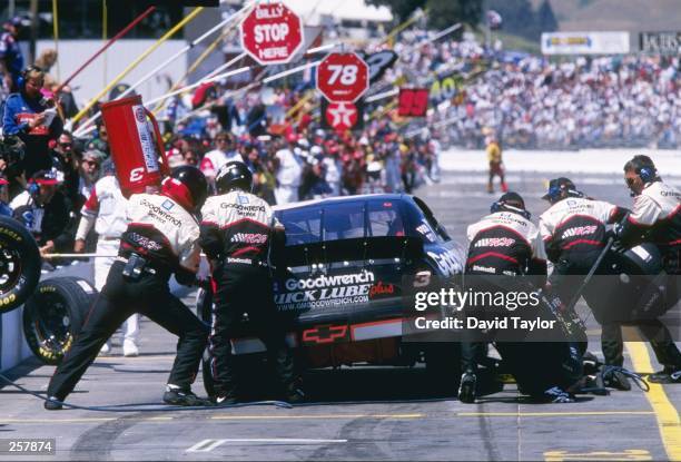 Dale Earnhardt has his car serviced during the NASCAR Save Mart 300 at the Sears Point International Raceway in Sonoma, California. Mandatory Credit:...