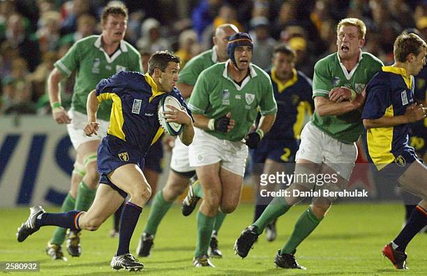 Iulian Andrei of Romania in action during the Rugby World Cup Pool A match between Ireland and Romania at Central Coast Stadium October 11, 2003 in...