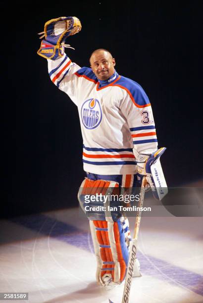 Hall of Fame goalie Grant Fuhr of the Edmonton Oilers waves to the crowd during his number retirement ceremony at the Skyreach Center October 9, 2003...