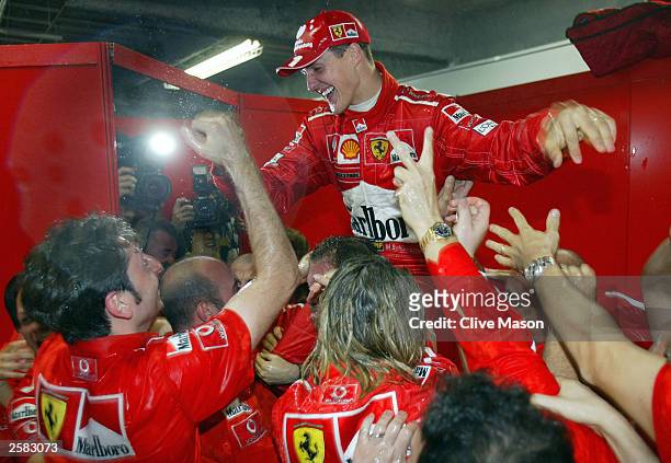 Michael Schumacher of Germany and Ferrari celebrates winning his 6th World Championship during the Formula One Japanese Grand Prix in Suzuka on...
