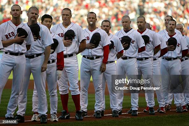 The Boston Red Sox take to the field for pregame ceremonies sporting a shaved head motif as the New York Yankees defeated the Boston Red Sox 4-3...