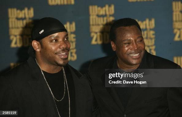 George Besson Jr Singer George Benson and son Marcus attend the