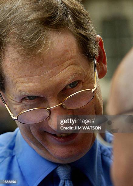 British Prime Minister Tony Blair''s official spokesman Tom Kelly speaks to the press outside No. 10 Downing Street in London, 13 October 2003. AFP...