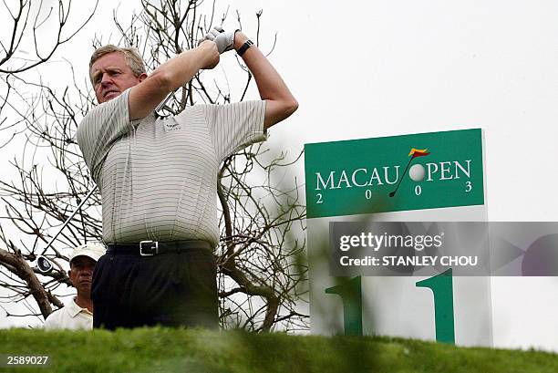 Colin Montgomerie of Scotland hits his tee-shot on the 11th hole during official practice of the Macau Open 14 October 2003 at the Macau Golf and...