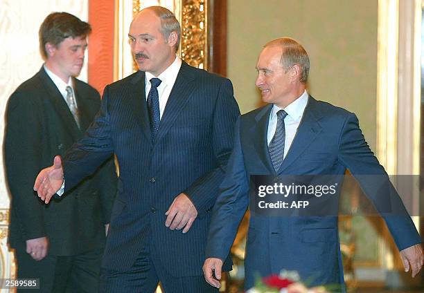Belarus President Alexander Lukashenko and Russian President Vladimir Putin are pictured ahead of a meeting in Moscow''s Kremlin, 14 October 2003....