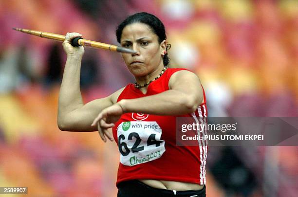 Tunisian Aida Sellem throws the javelin, 13 October 2003 to win gold medal in the womens javelin at the 8th All African Games in Abuja. AFP...