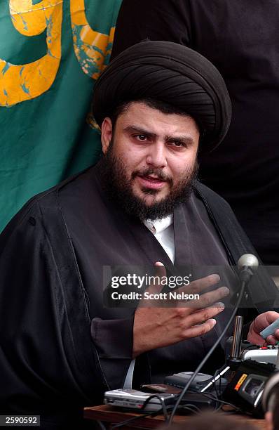 Iraqi Shia cleric Moqtada al-Sadr addresses questions during a press conference regarding his announced rival Iraqi government October 14, 2003 in...