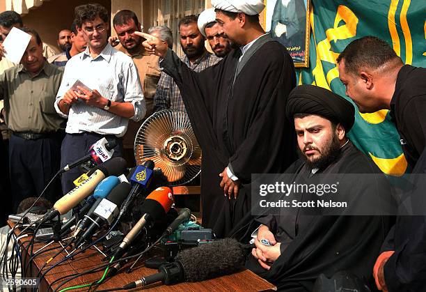 Iraqi Shia cleric Moqtada al-Sadr addresses questions during a press conference regarding his announced rival Iraqi government October 14, 2003 in...