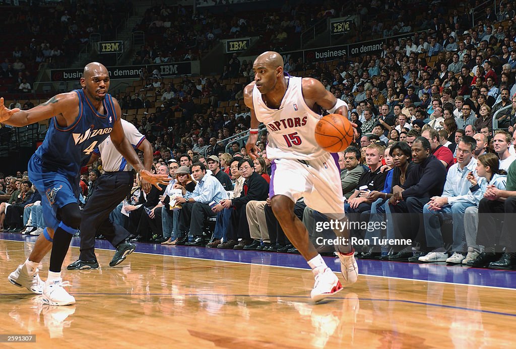 Vince Carter drives around Stackhouse