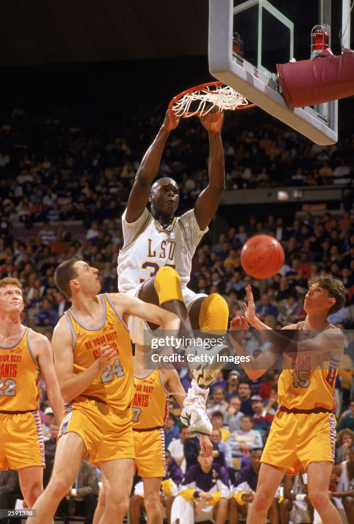 Shaquille O''Neal slam dunks