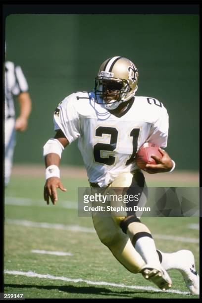 Running back Dalton Hilliard of the New Orleans Saints moves the ball during a game against the San Diego Chargers at Jack Murphy Stadium in San...