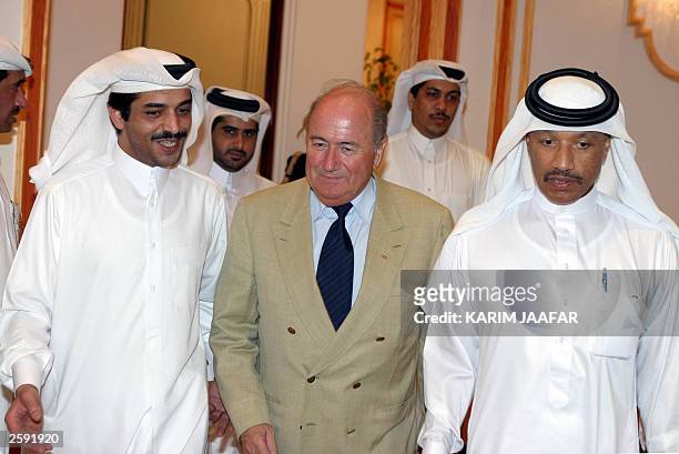 Mohammed bin Hammam , president of the Asian Football Confederation , and Khalifa bin Hassan al-Thani , head of the Qatari Football Federation,...