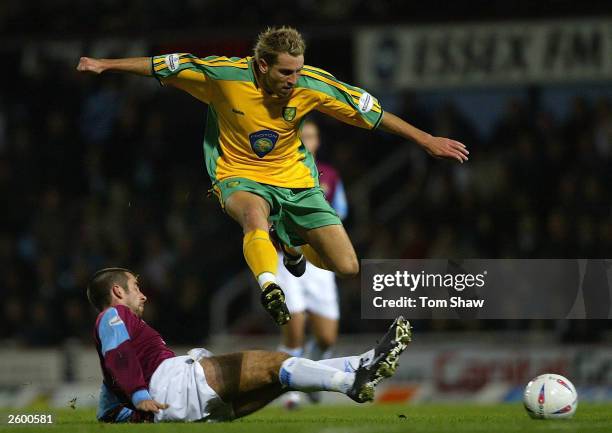 Darren Huckerby of Norwich tusses with Kevin Horlock of West Ham during the Nationwide League Division One match between West Ham United and Norwich...