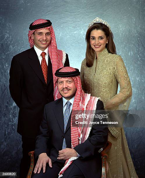 King of Jordan Abdullah II poses with his wife, Queen Rania and his brother, Crown Prince Hamzeh on February 10, 2000 in Ahman, Jordan.