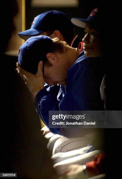 Starting pitcher Kerry Wood of the Chicago Cubs sits in the dugout during the seventh inning against the Florida Marlins during game seven of the...