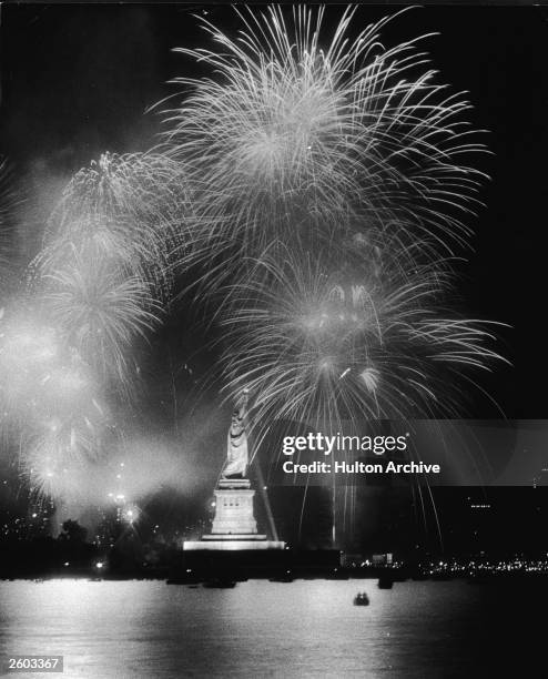 Fireworks explode around the Statue of Liberty duiring the American Bicentennial celebration, New York City, July 4, 1976.
