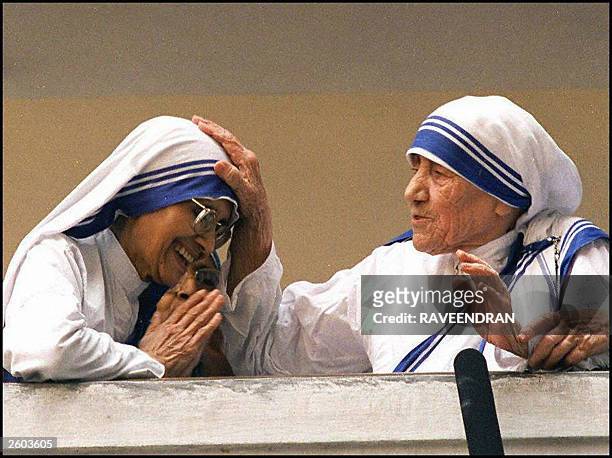 In this file picture taken, 14 March 1997, shows Mother Teresa with Sister Nirmala greeting people at the Missionaries of Charity headquarters in...