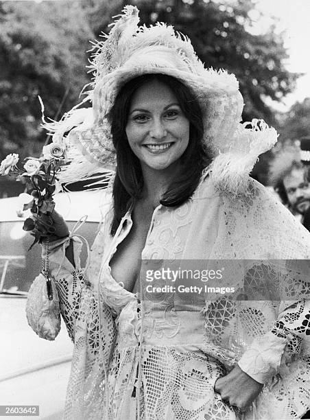 American actor Linda Lovelace poses in a lace outfit while on a film set in England, June 19, 1974. The star of the pornographic film 'Deep Throat'...