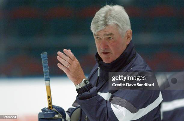 Head Coach Pat Quinn of the Toronto Maple Leafs instructs his players during practice for the NHL Challenge 2003, at the Globe Arena, in Stockholm,...