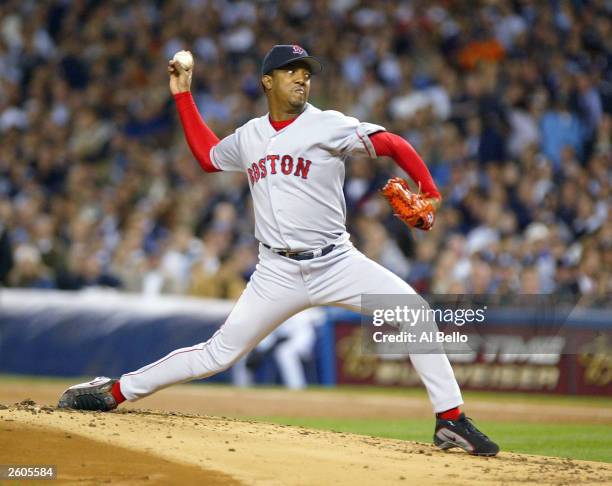 Pedro Martinez of the Boston Red Sox pitches against the New York Yankees in the first inning during game 7 of the American League Championship...