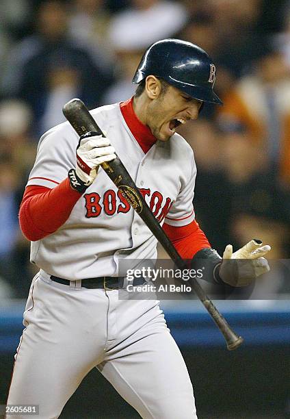 Nomar Garciaparra of the Boston Red Sox reacts after striking out in the seventh inning against the New York Yankees during game 7 of the American...