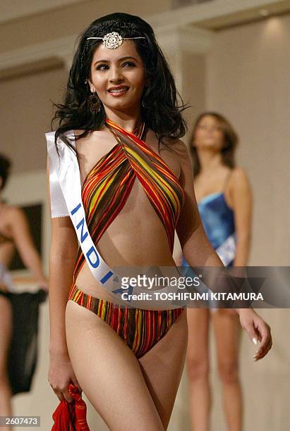 Shonali Nagrani, 21-year-old Miss India, shows off her swim wear during the Miss International Beauty Pageant press conference in Tokyo, 01 October...
