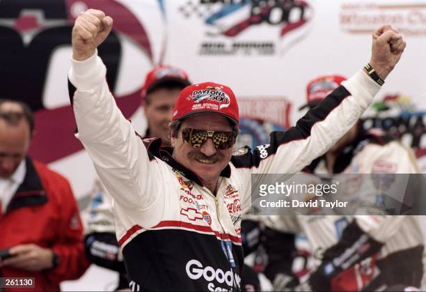 Dale Earnhardt celebrates after winning the Daytona 500 at Daytona International Speedway in Daytona Beach, Florida.