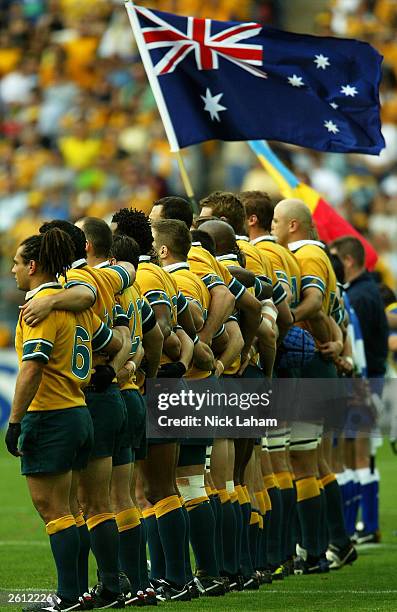 The Wallabies line up for the National Anthem during the Rugby World Cup Pool A match between Australia and Romania at Suncorp Stadium October 18,...