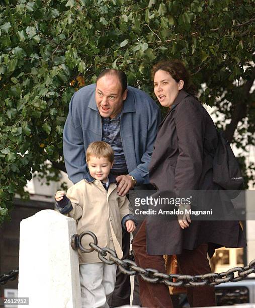 Actor James Gandolfini is shown on the set of "The Sopranos" filming by the Plaza Hotel with his son Michael October 15, 2003 in New York.