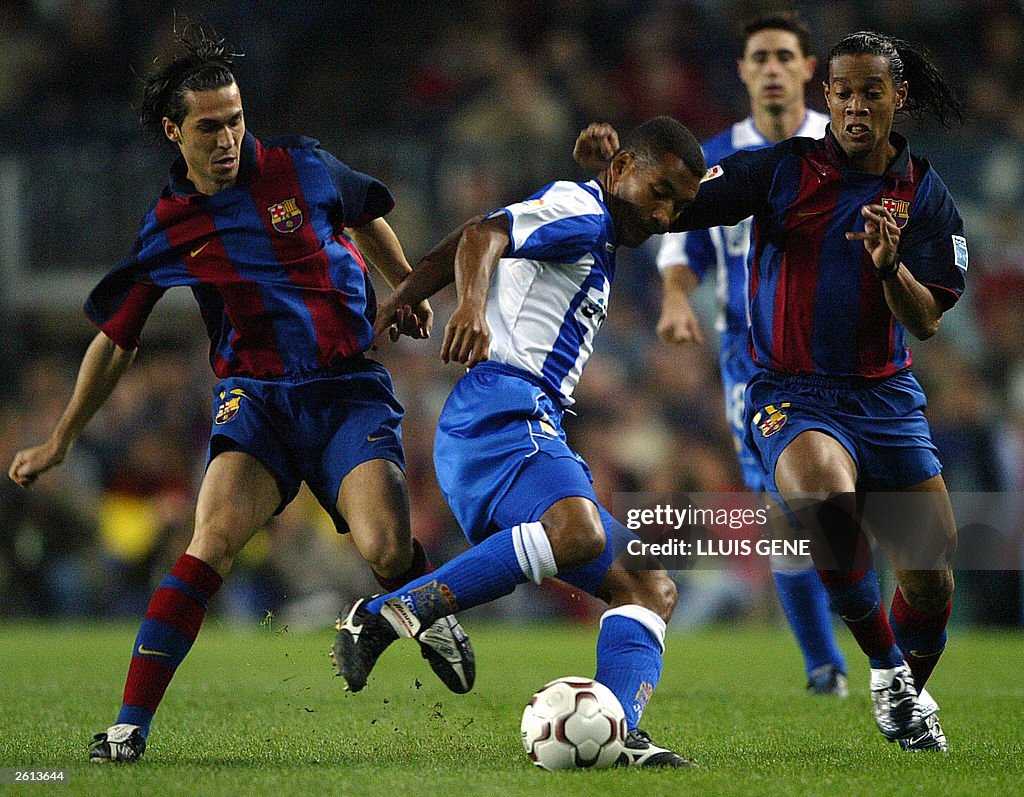 FC Barcelona Barzilian Ronaldinho(L) and
