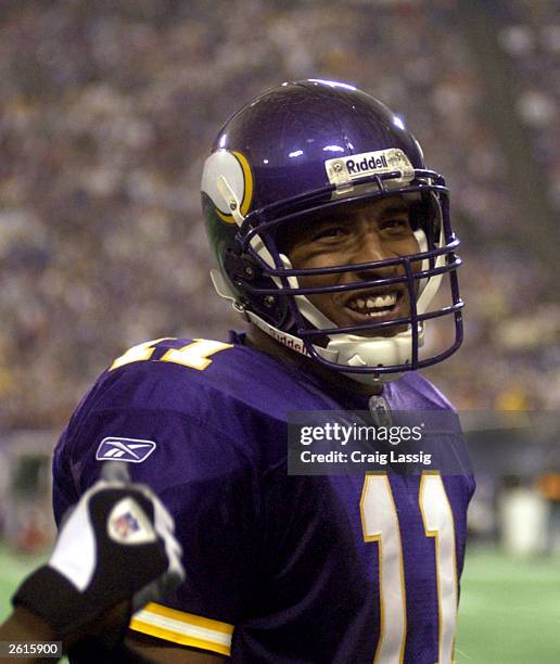 Quarterback Daunte Culpepper of the Minnesota Vikings is relaxed on the sidelines as they defeated the Denver Broncos 28-20 October 19, 2003 at the...