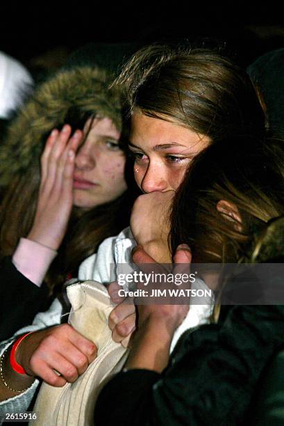 Emma Stanley of southeast London sheds a tear, holding onto American Illustionist David Blaine's pillow that was thrown to the crowd 19 October 2003...