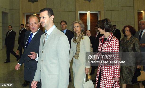 Syrian President Bashar al-Assad and his wife Asma receive King Juan Carlos and Queen Sofia of Spain and Spanish Foreign Minister Anna Palacio at the...