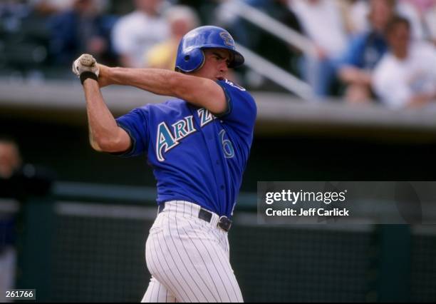 Infielder Travis Lee of the Arizona Diamondbacks in action during a spring training game against the Anaheim Angels at the Tucson Electric Park in...