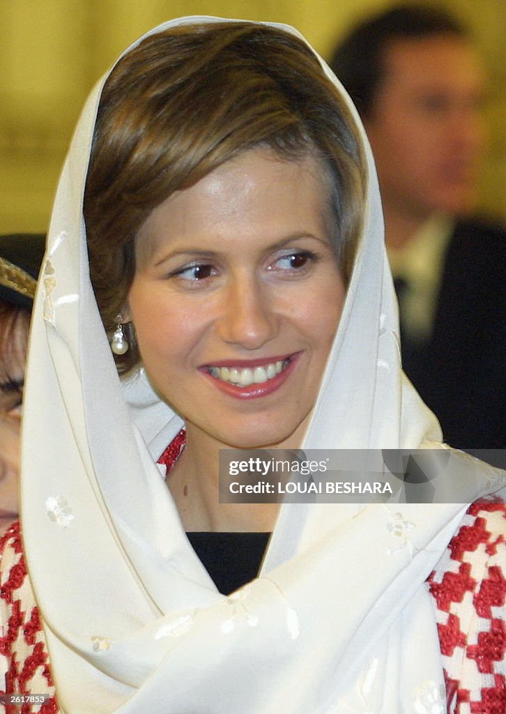 Syria's First Lady Asma alAssad is seen wearing a head scarf during Syria's First Lady Asma alAssad is seen wearing a head scarf during
