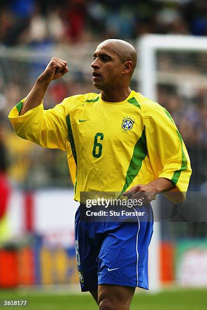 Roberto Carlos of Brazil celebrates his goal during the International friendly match between Brazil and Jamaica on October 12, 2003 at The Walkers...