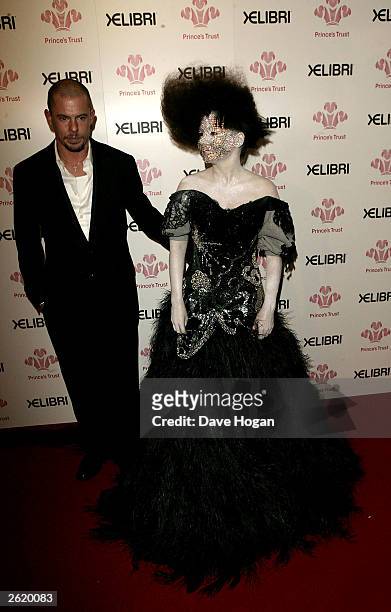 Bjork and Alexander McQueen are seen backstage at the "Fashion Rocks" event for The Prince's Trust at the Royal Albert Hall on October 15, 2003 in...