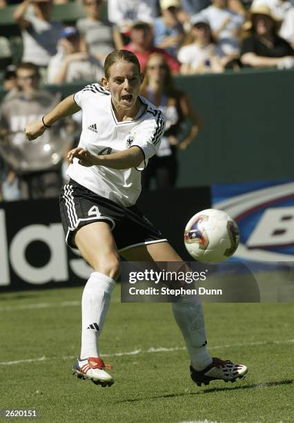 Nia Kuenzer of Germany plays the ball against Sweden during the FIFA Women's World Cup Final on October 12, 2003 at Home Depot Center in Carson,...