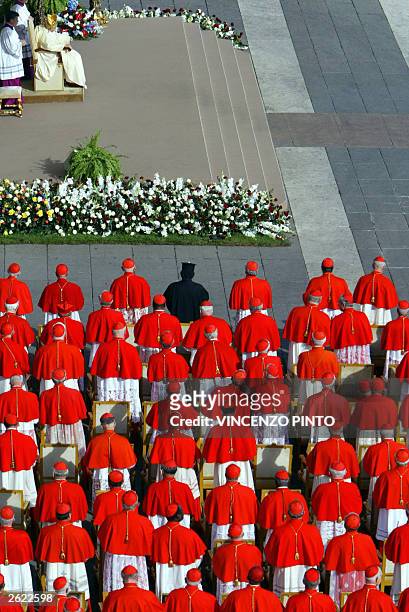 Vatican: Cardinals attend a ceremony presided by Pope John Paul II to appoint 30 new cardinals on St Peter square 21 October 2003 at the Vatican. The...