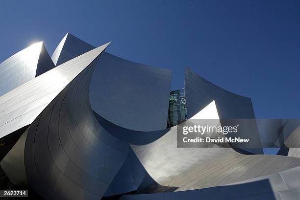 Clad in more than six thousand steel panels, the curving and folding exterior walls of the new Walt Disney Concert Hall are shown October 20, 2003 in...