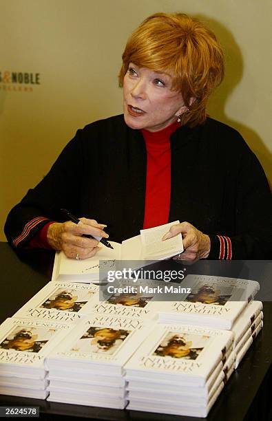 Actress Shirley Maclaine signs copies of her new book 'Out on a Leash' at Barnes and Nobles, Rockefeller Centre on October 21, 2003 in New York City.