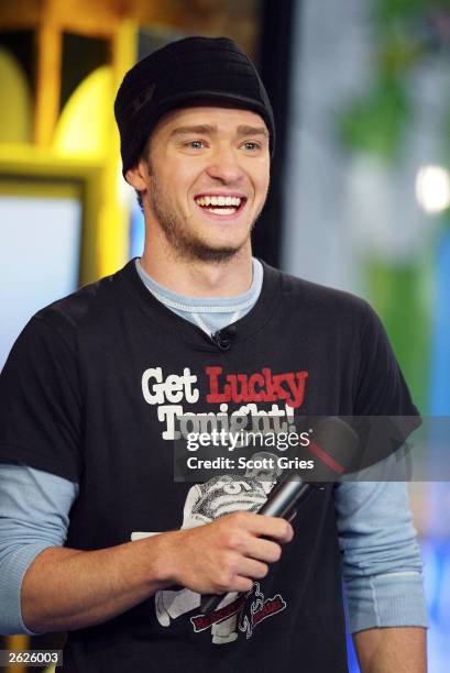 Justin Timberlake appears on stage during MTV's Total Request Live at the MTV Times Square Studios October 21, 2003 in New York City.