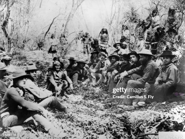 General George Crook, third from right holds council with Apache leader Geronimo, centre left for a three day conference at Canyon de los Embudos,...