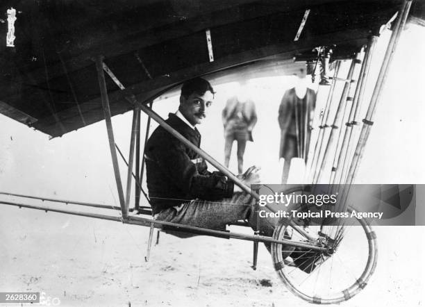 French aviator Roland Garros in his Santos-Dumont Demoiselle aeroplane, who took part in the 1911 European Circuit race.