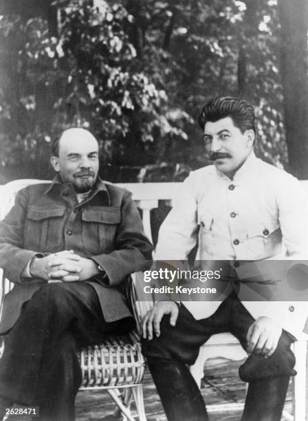 Soviet Communist leader Joseph Stalin , right, with Soviet leader Vladimir Ilyich Lenin , in Gorky .